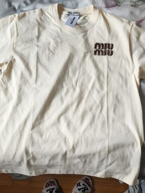 NEW WITH TAGS Cream Short Sleeve Tee with Embellished Logo